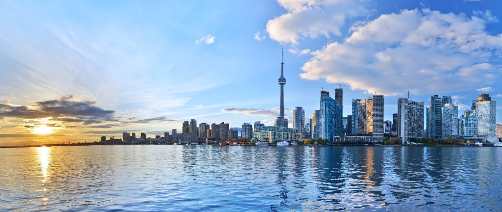 Panorama of Toronto skyline at sunset in Ontario, Canada.