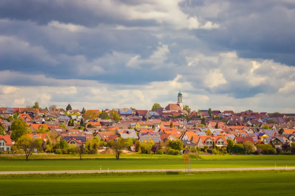 The town of Dettingen in Baden-Württemberg, Germany. Small german village. Cloudy sky, bright sunny summer day.