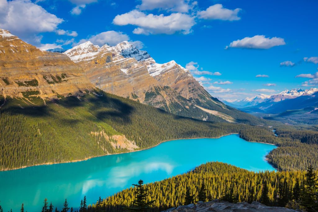 Panorama with lake, mountains and forest in Canada
