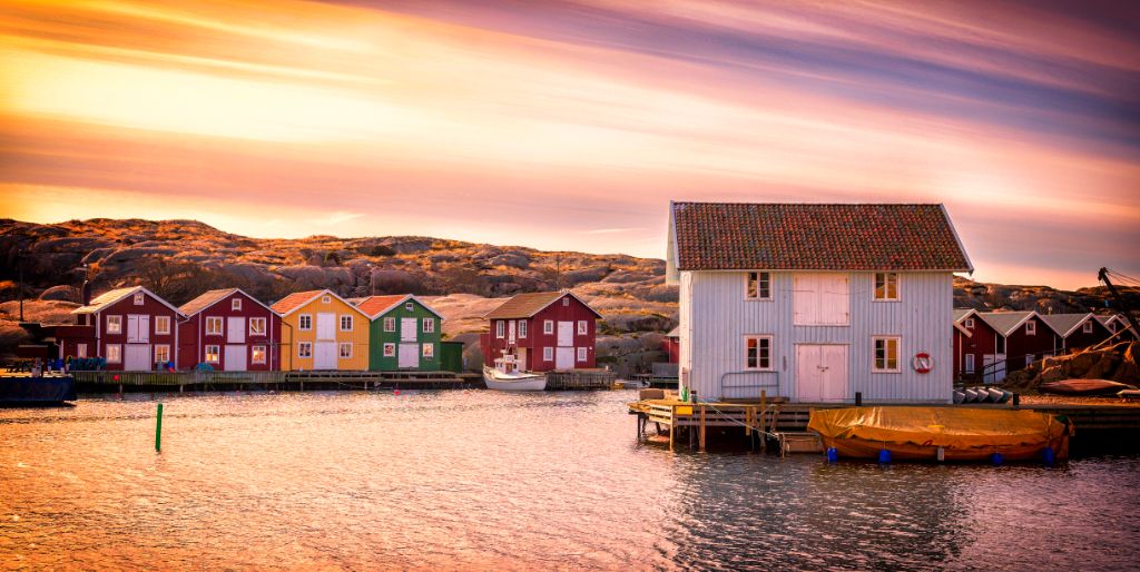 Colorful houses on the fjord in the sun
