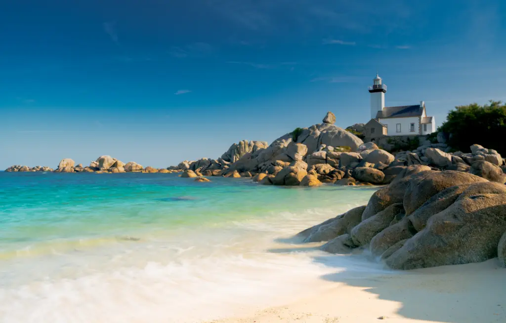 view of the Pontusval lighthouse and bay on the north coast of Brittany in France